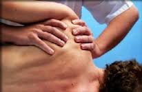 patients shoulder being massaged
